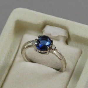 1985 Avon Simulated Sapphire Blue Elegance Ring Silver Tone Setting Size 7